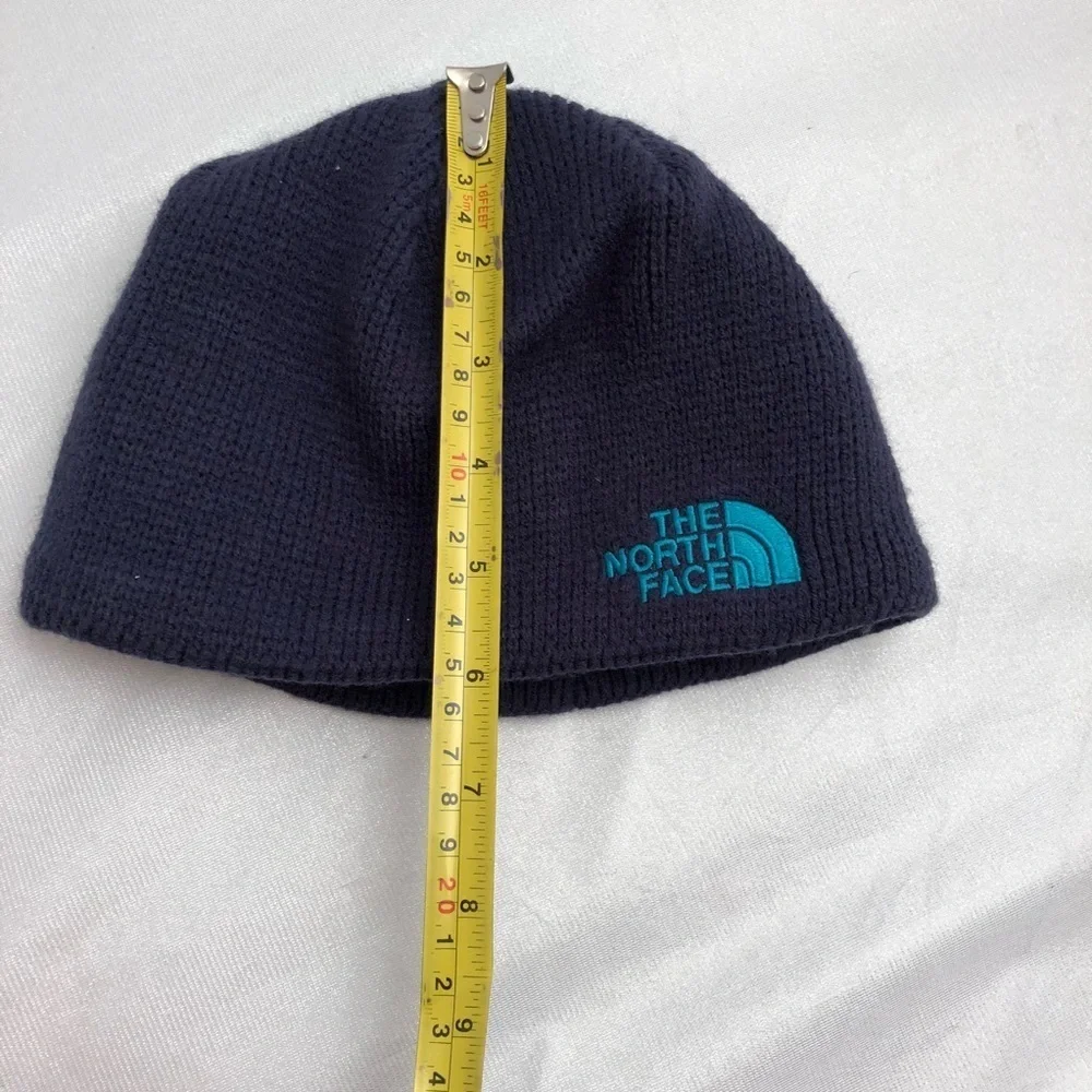 The North Face navy blue youth knit cap hat